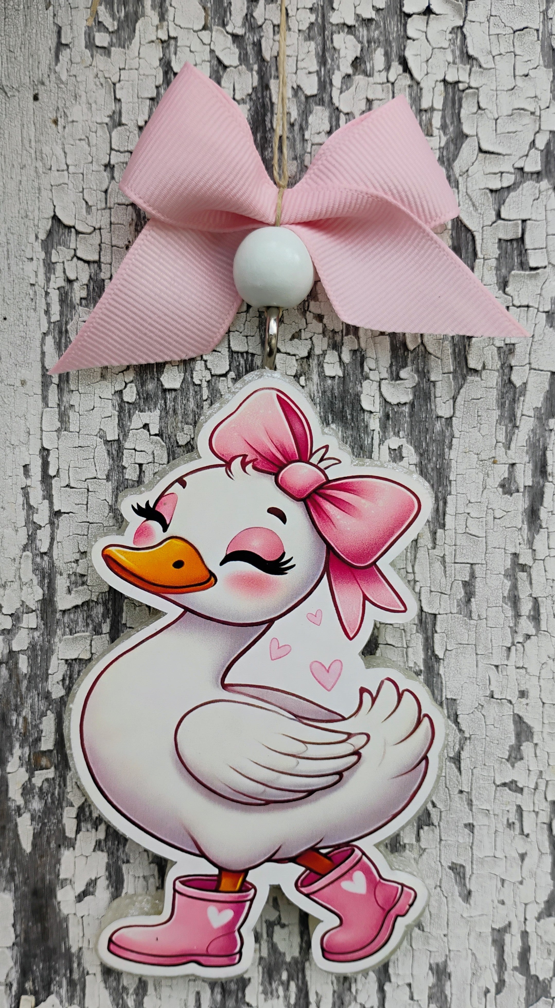 Goose in pink rain boots and bow car freshie